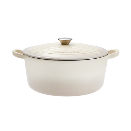 Cuisine::pro® LE CONNOISSEUR™ 6.6 Qt. Round French Oven in beige with a self-basting lid.